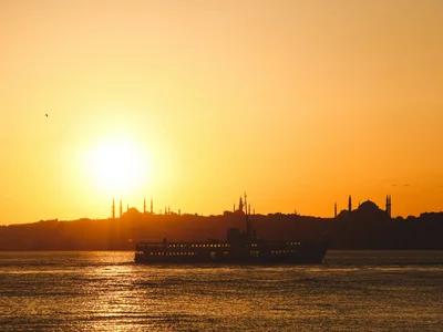 Summer sunset on the Bosphorus in Istanbul. Photo by Yusuf Onuk on Unsplash