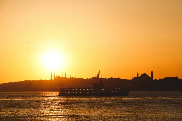 Summer sunset on the Bosphorus in Istanbul. Photo by Yusuf Onuk on Unsplash